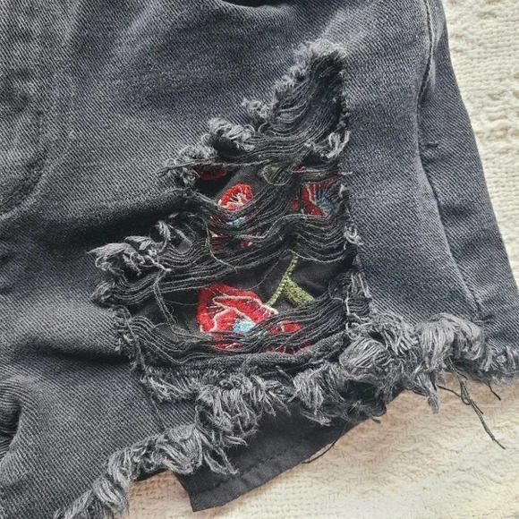 Dex, Distressed Cutoffs with Peekaboo Rose Embroidered Pockets. - Picture 3 of 8